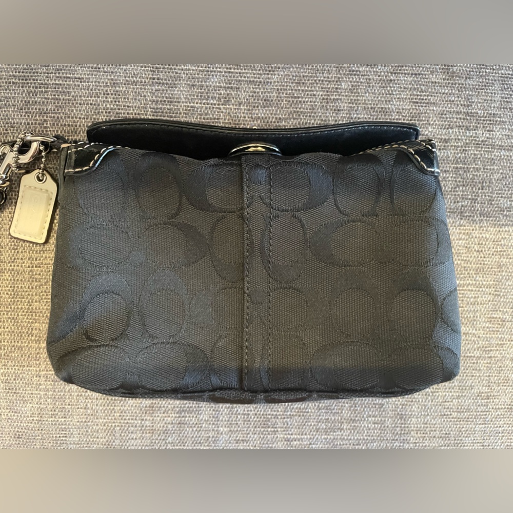 Coach black wristlet with top clasp